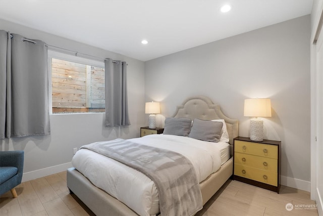 bedroom with light wood-type flooring