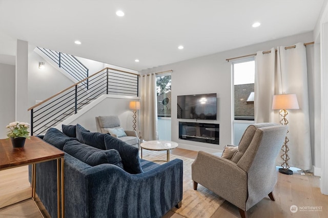 living room with light hardwood / wood-style floors