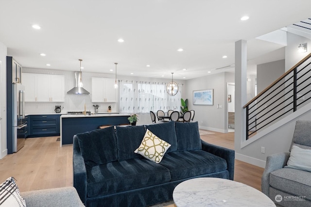 living room with light hardwood / wood-style floors