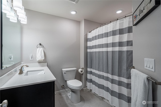 bathroom with curtained shower, tile patterned flooring, vanity, and toilet