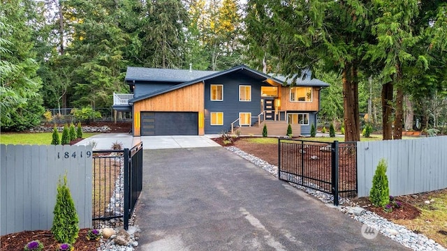 view of front of property with a garage