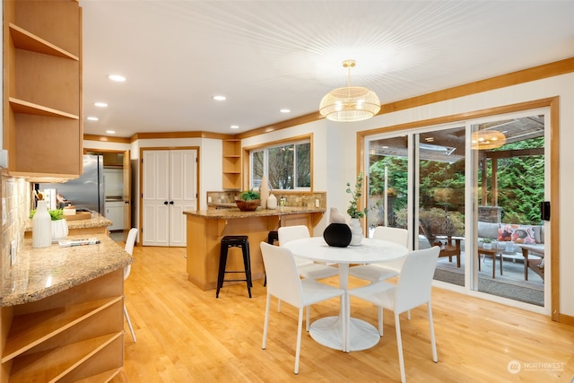 dining area featuring light hardwood / wood-style floors