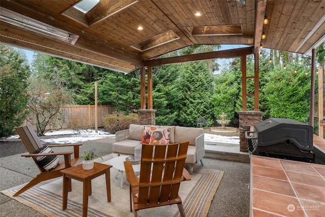 view of patio / terrace featuring an outdoor living space and area for grilling