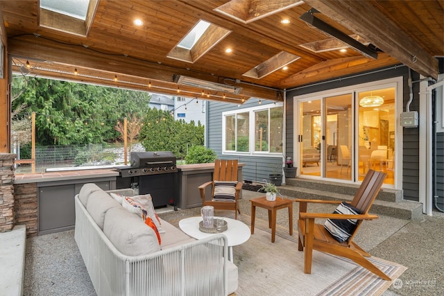 view of patio / terrace featuring an outdoor kitchen and area for grilling