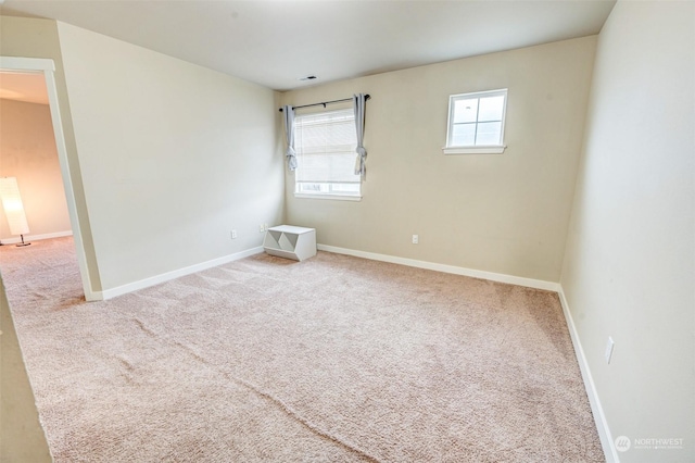 view of carpeted spare room