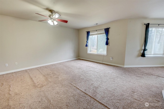 carpeted empty room with ceiling fan