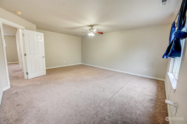 interior space featuring ceiling fan