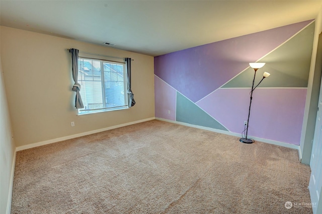 view of carpeted spare room