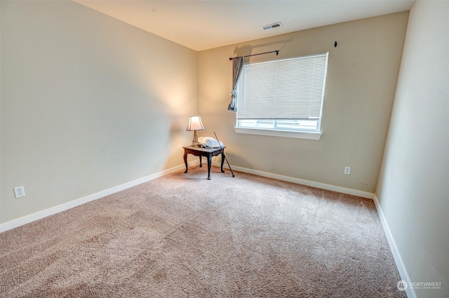 view of carpeted spare room