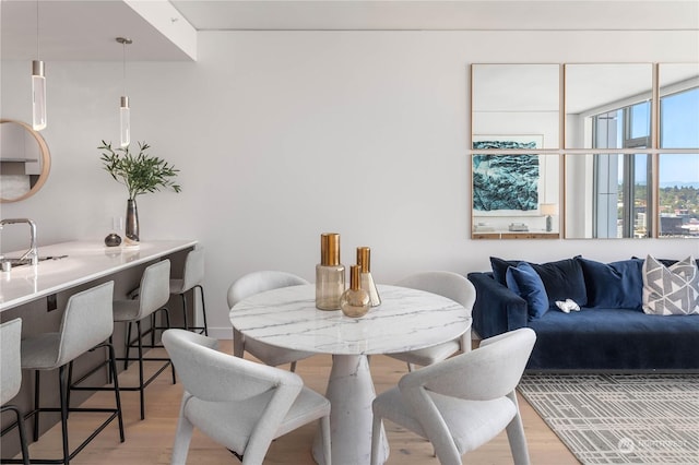 dining room featuring light hardwood / wood-style floors