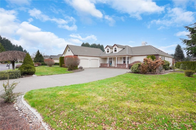 view of front of home featuring a garage and a front lawn