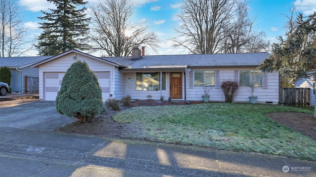 ranch-style home with a garage and a front lawn