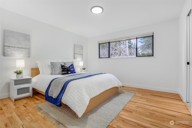 bedroom featuring wood-type flooring