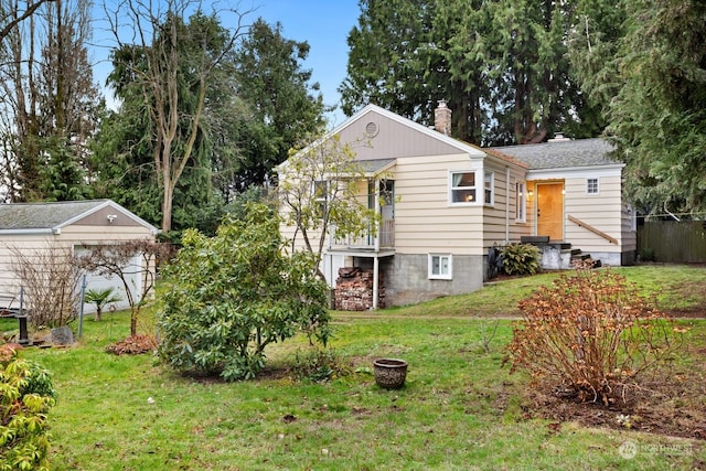 exterior space with a yard and a fire pit