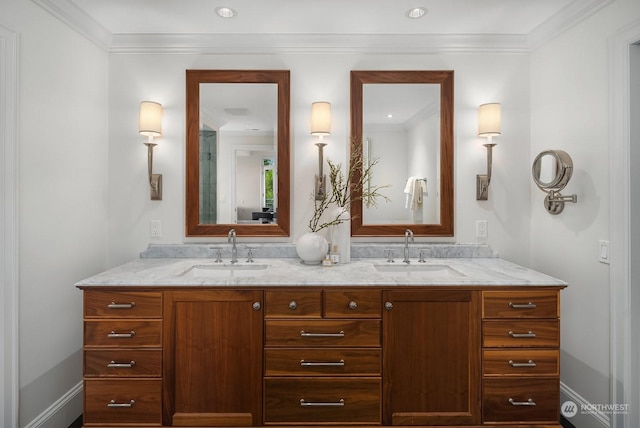 bathroom featuring vanity and ornamental molding