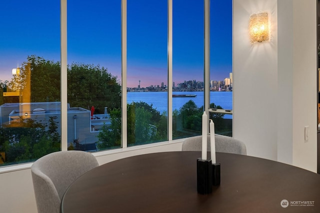 dining area featuring a water view