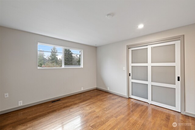 empty room featuring light hardwood / wood-style floors