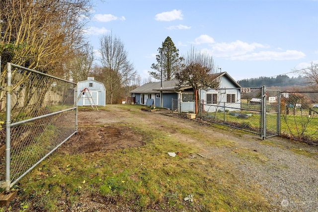 view of yard with a storage shed