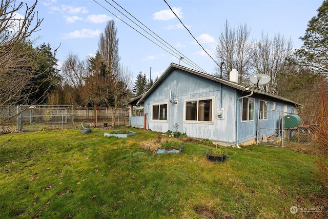 view of home's exterior featuring a yard