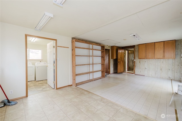 basement featuring washer and clothes dryer