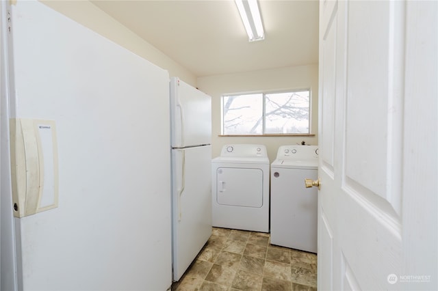 washroom featuring independent washer and dryer