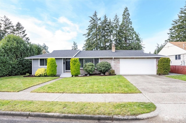 single story home with a front yard and a garage