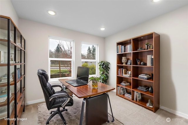 view of carpeted office space