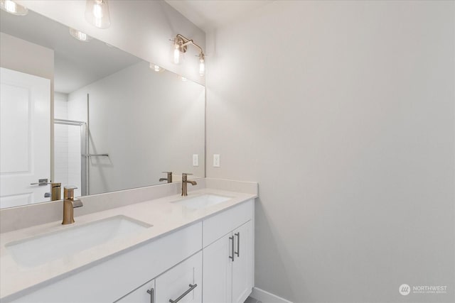 bathroom featuring vanity and a shower with door