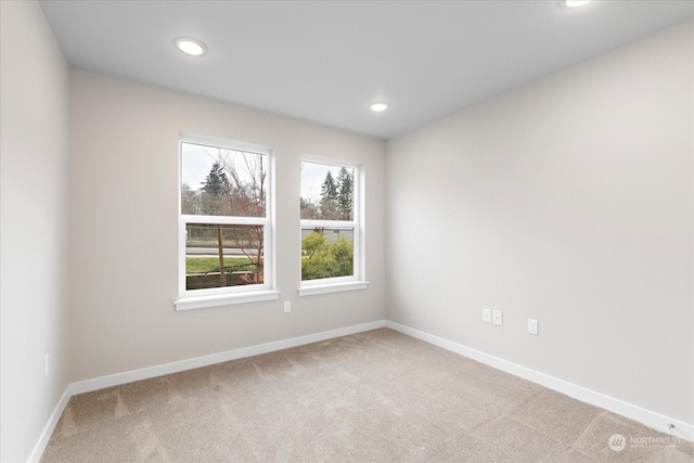 empty room with carpet flooring