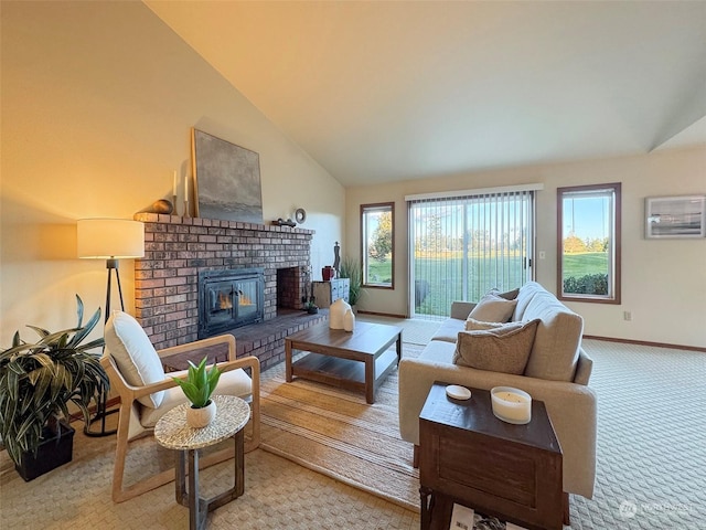 carpeted living room featuring lofted ceiling and a fireplace