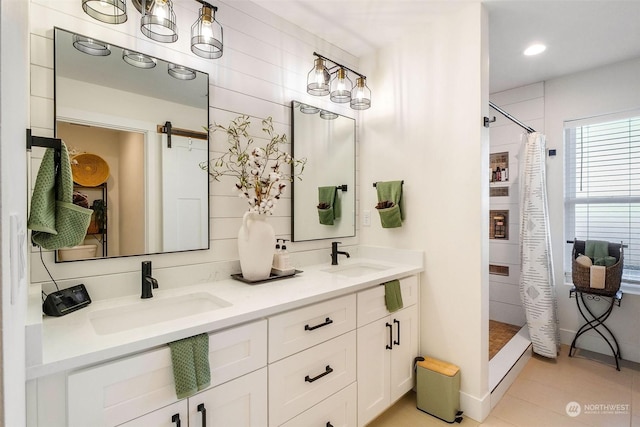 bathroom featuring vanity, tile patterned flooring, and a shower with shower curtain