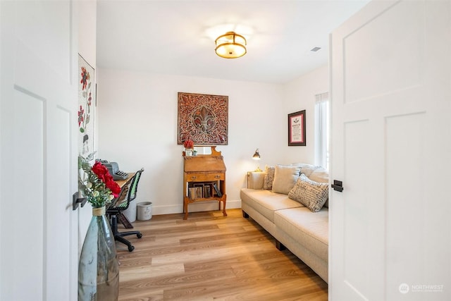 living area with light wood-type flooring