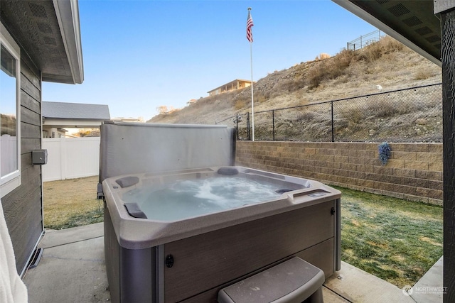 view of patio featuring a hot tub