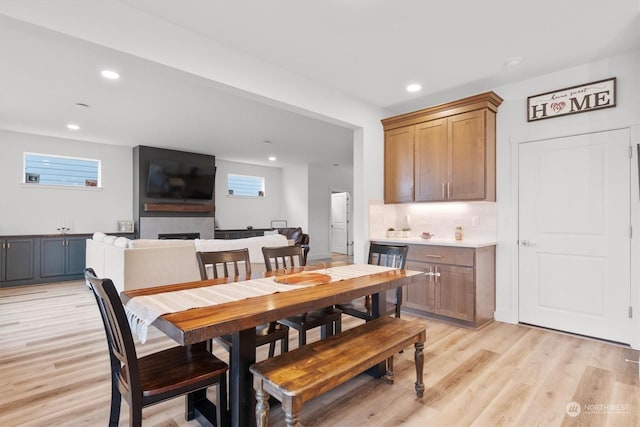 dining space featuring light hardwood / wood-style floors