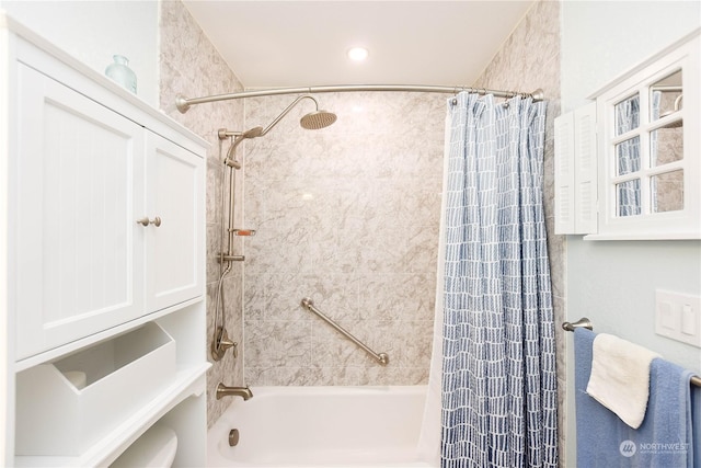 bathroom featuring shower / tub combo