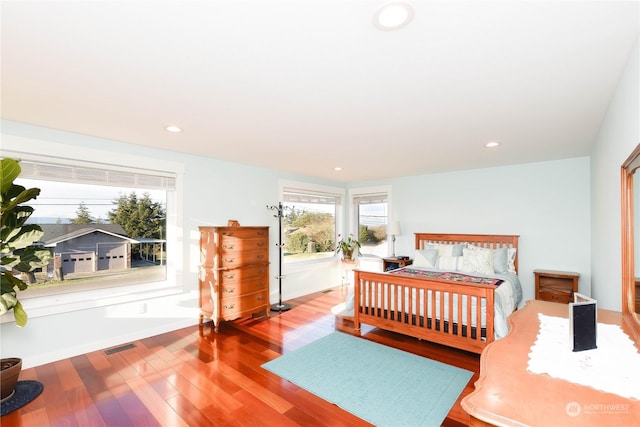 bedroom with light hardwood / wood-style floors