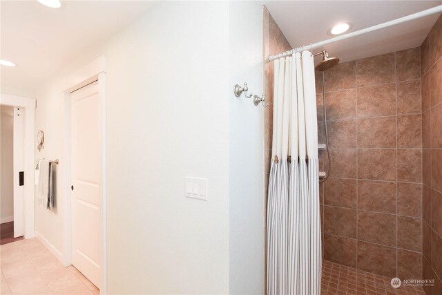 bathroom with a shower with curtain