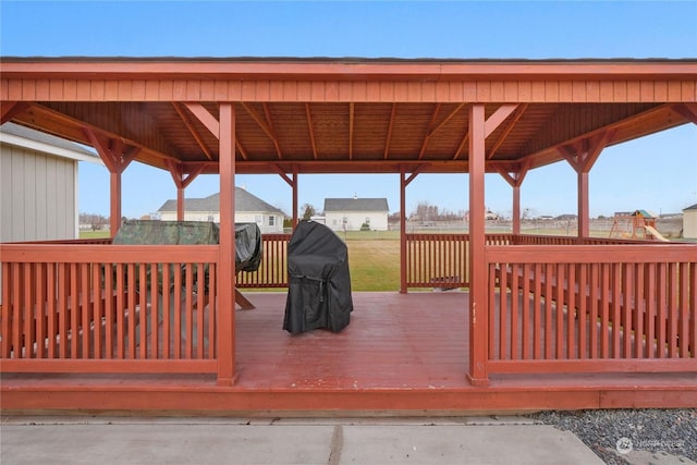 wooden terrace with a gazebo