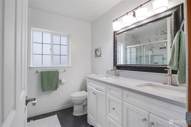 bathroom featuring toilet, an enclosed shower, tile patterned floors, and vanity