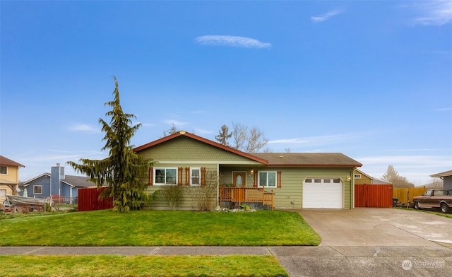 ranch-style home featuring a front lawn and a garage