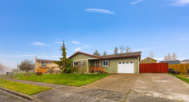 ranch-style home with a garage and a front yard