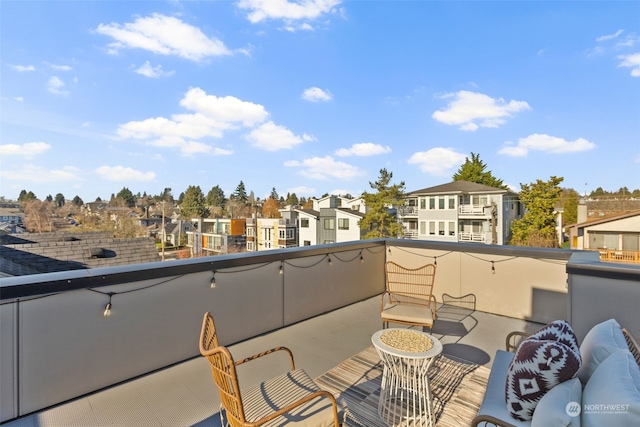 view of patio featuring a balcony