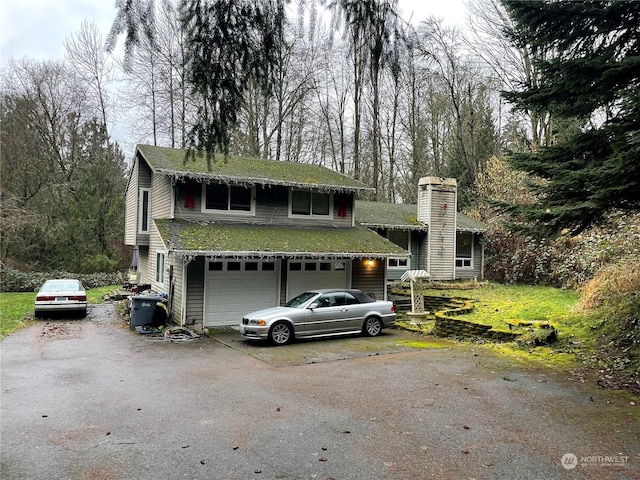 view of front of home with a garage