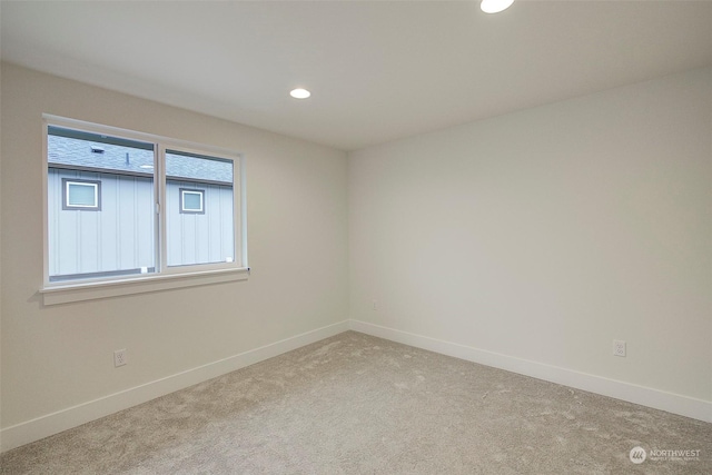 view of carpeted spare room