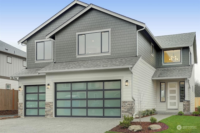 view of front of property with a garage