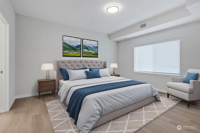 bedroom featuring wood-type flooring