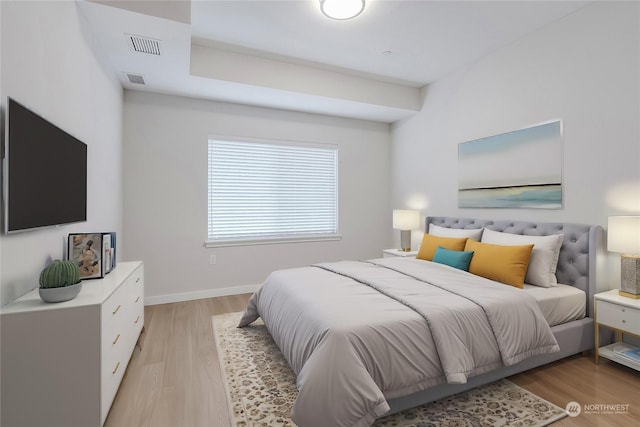 bedroom with light hardwood / wood-style flooring