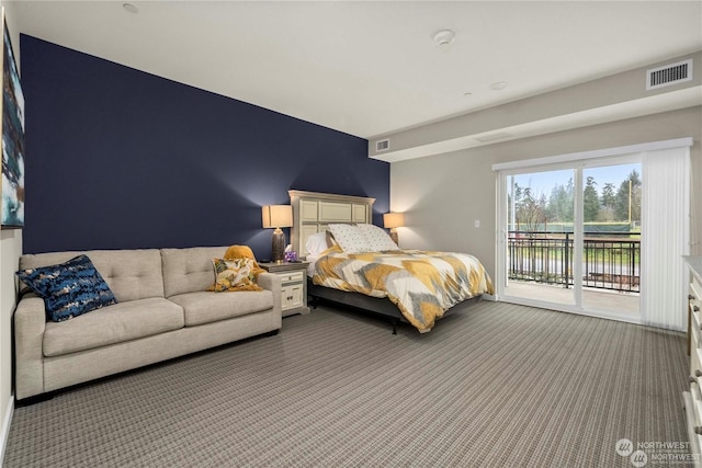 bedroom featuring access to outside and carpet floors