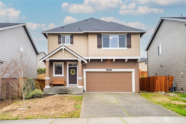 view of front of home with a garage