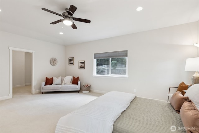 carpeted bedroom featuring ceiling fan, baseboards, and recessed lighting